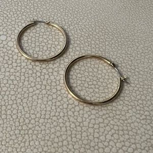 Free People Plated Gold Thin Hoop Earrings.
